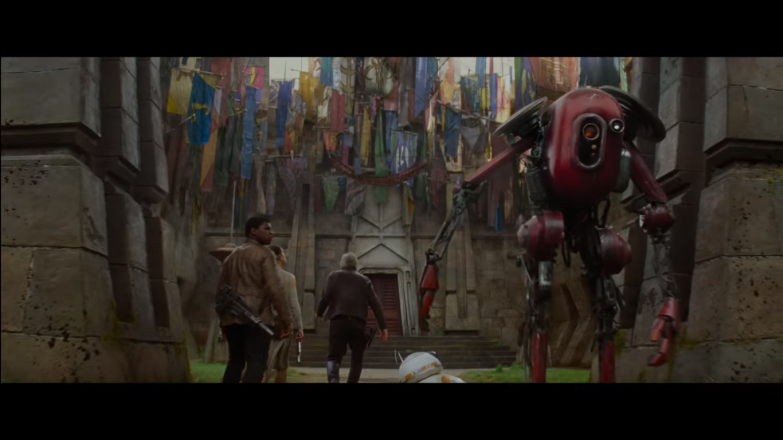 Now here is where it gets interesting: Han Solo, Finn, and Rey entering a building associated with the Mandalorians